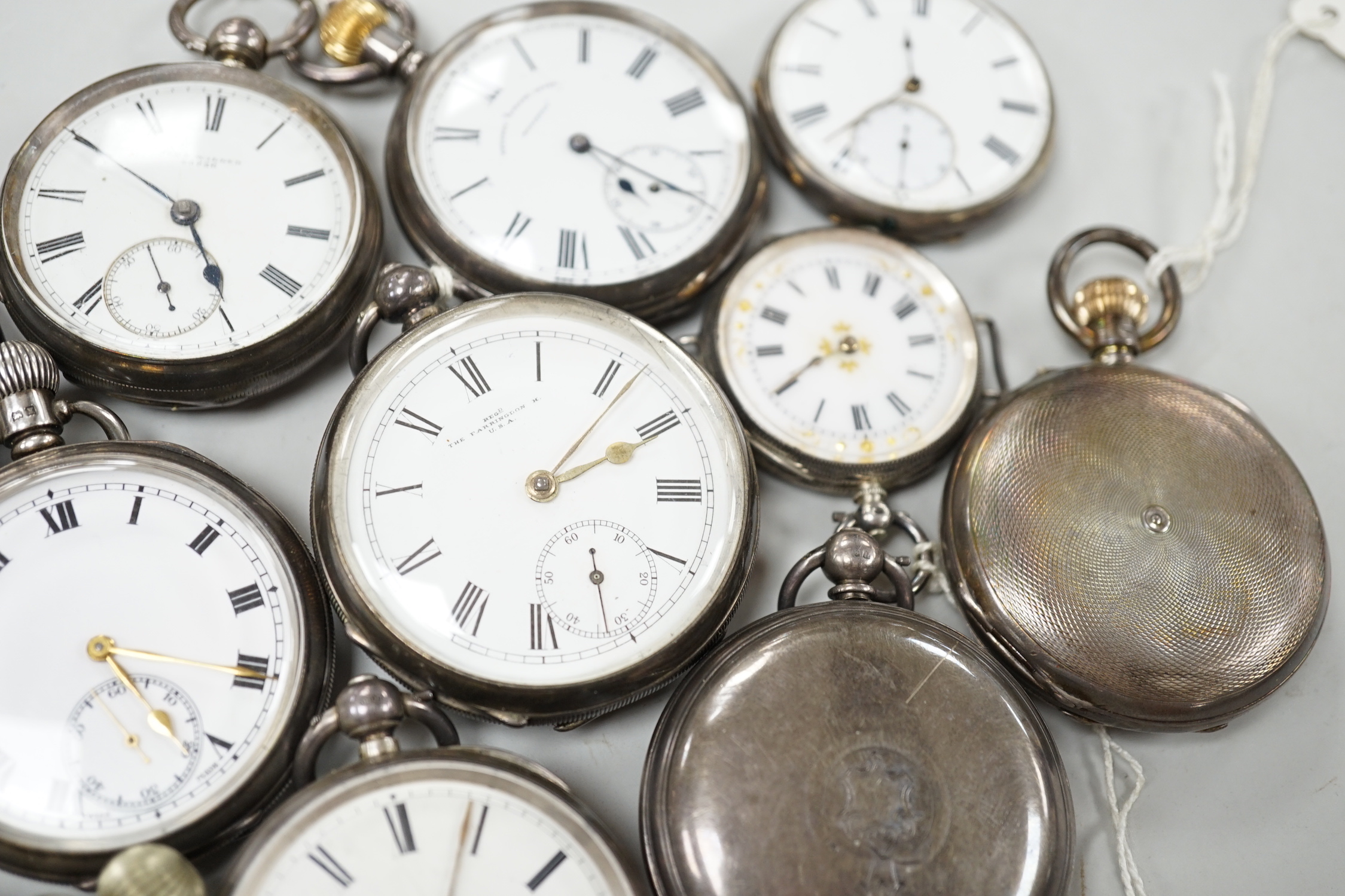 Twelve assorted mainly silver pocket watches including 'The Farringdon', Russell's and John Walker.